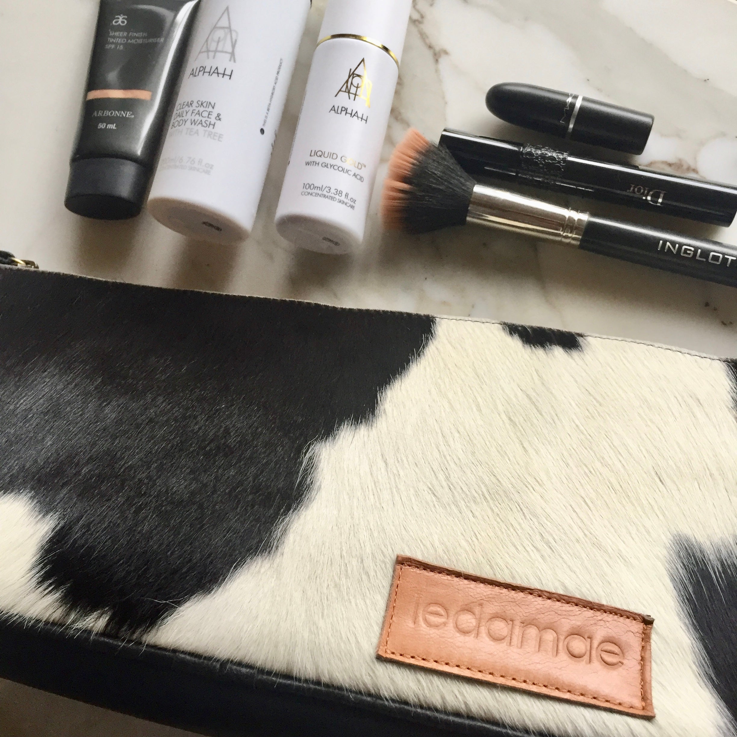 'BROOKLYN' black leather + black & white cowhide makeup/toiletry bag
