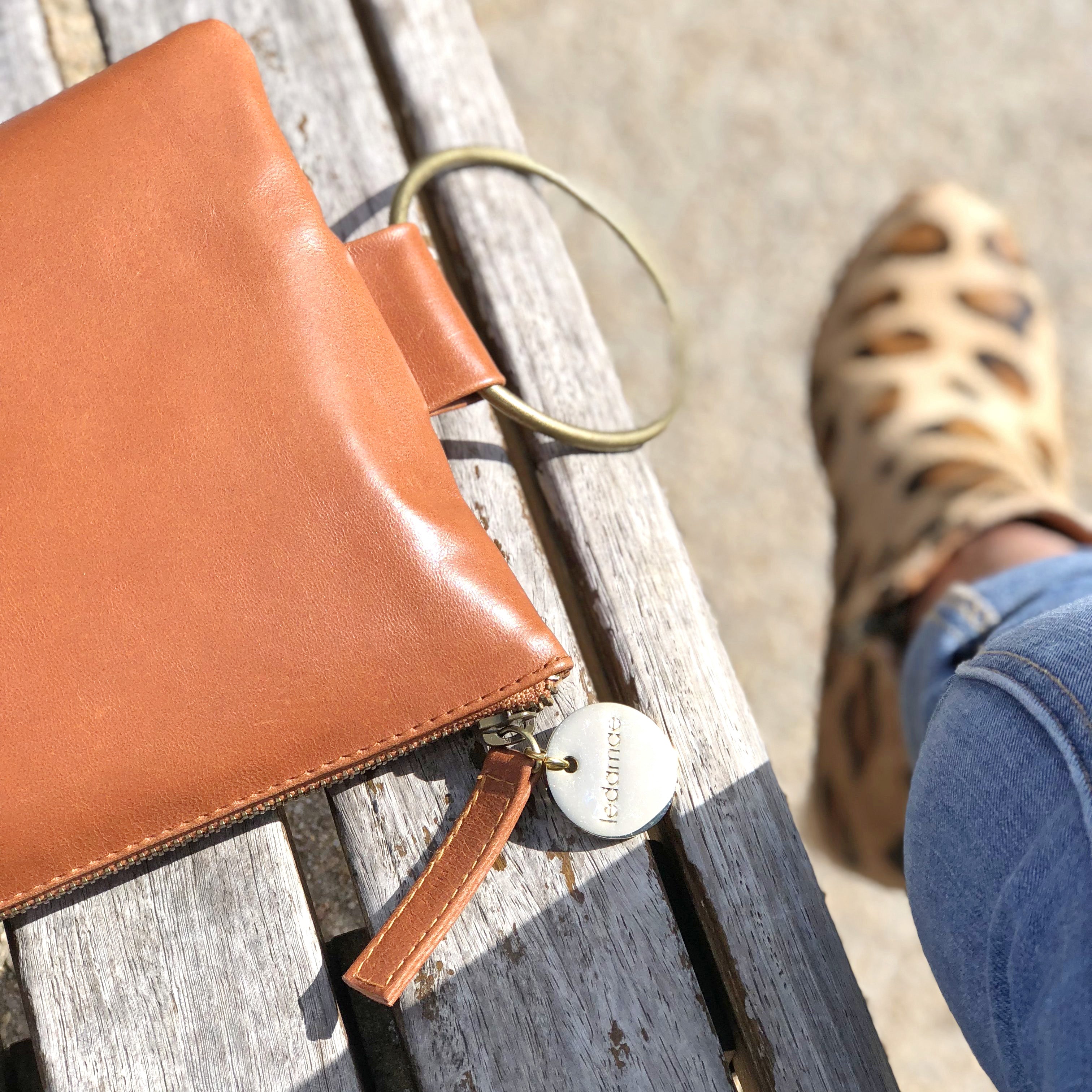 ' KLARC ' tan leather clutch