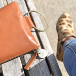 ' KLARC ' tan leather clutch